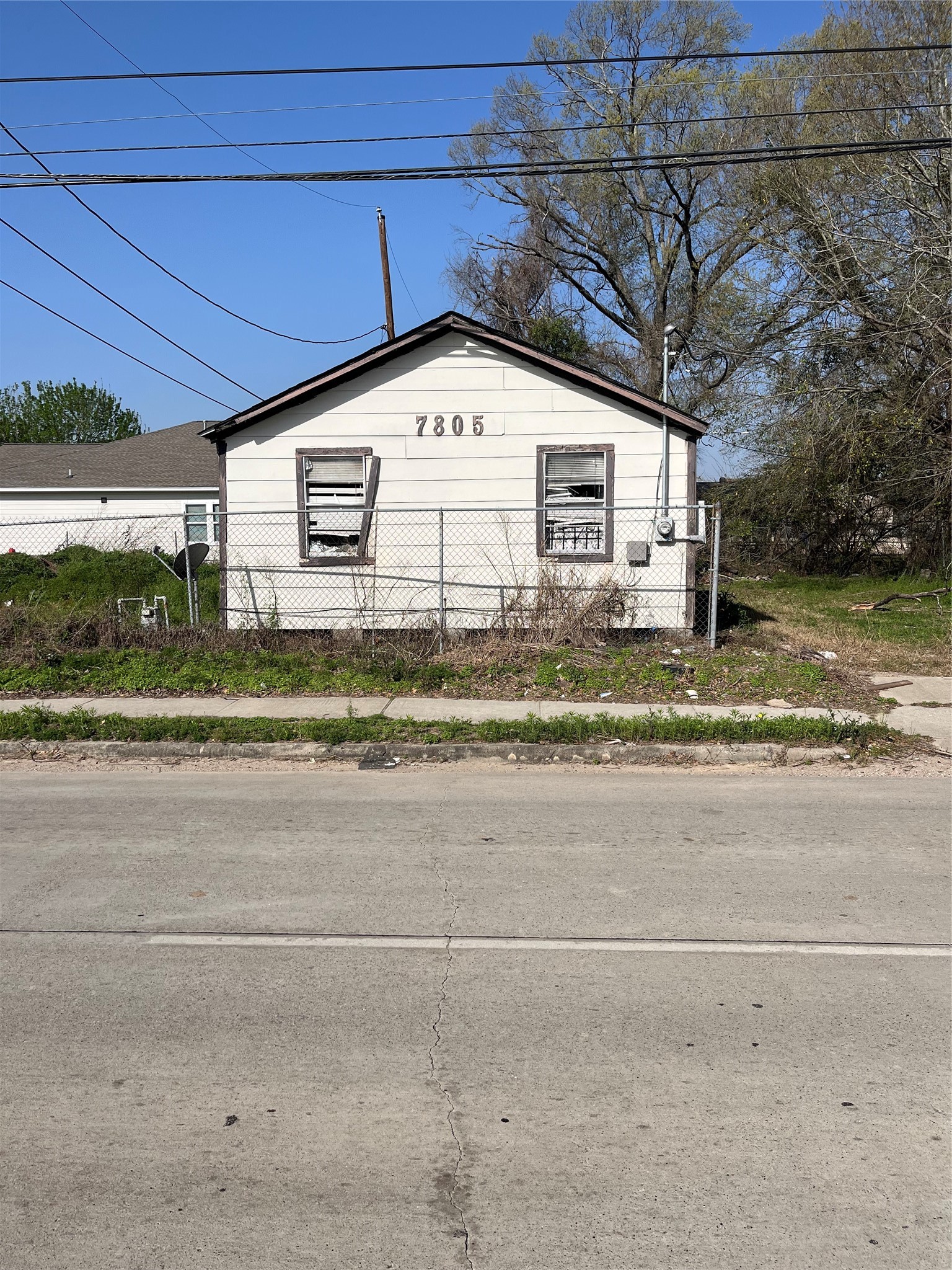 7805 Wheatley Street Houston, TX 77088 - Photo 2 of 8 a view of a house with a yard