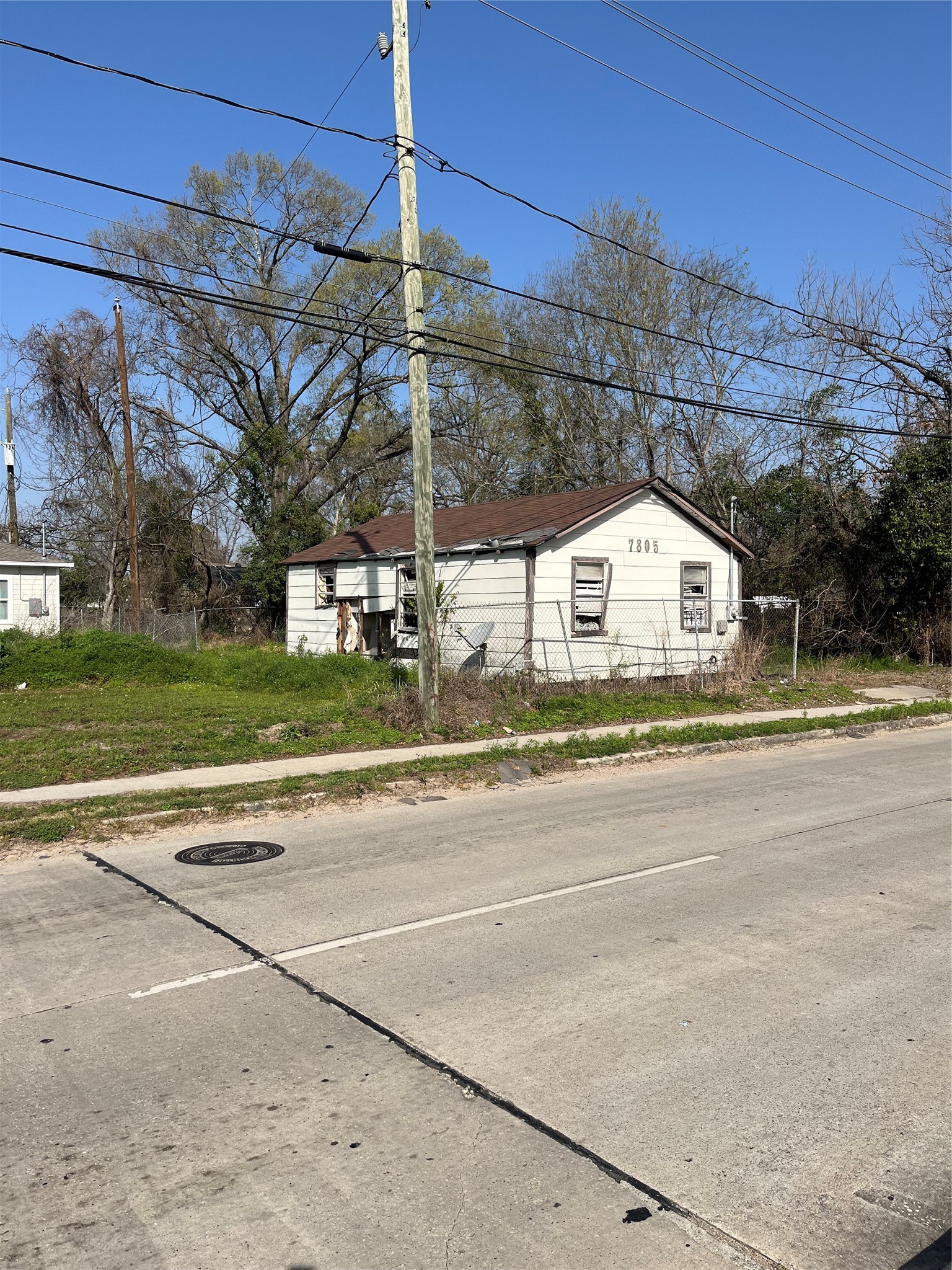7805 Wheatley Street Houston, TX 77088 - Photo 3 of 8 a view of a street with houses