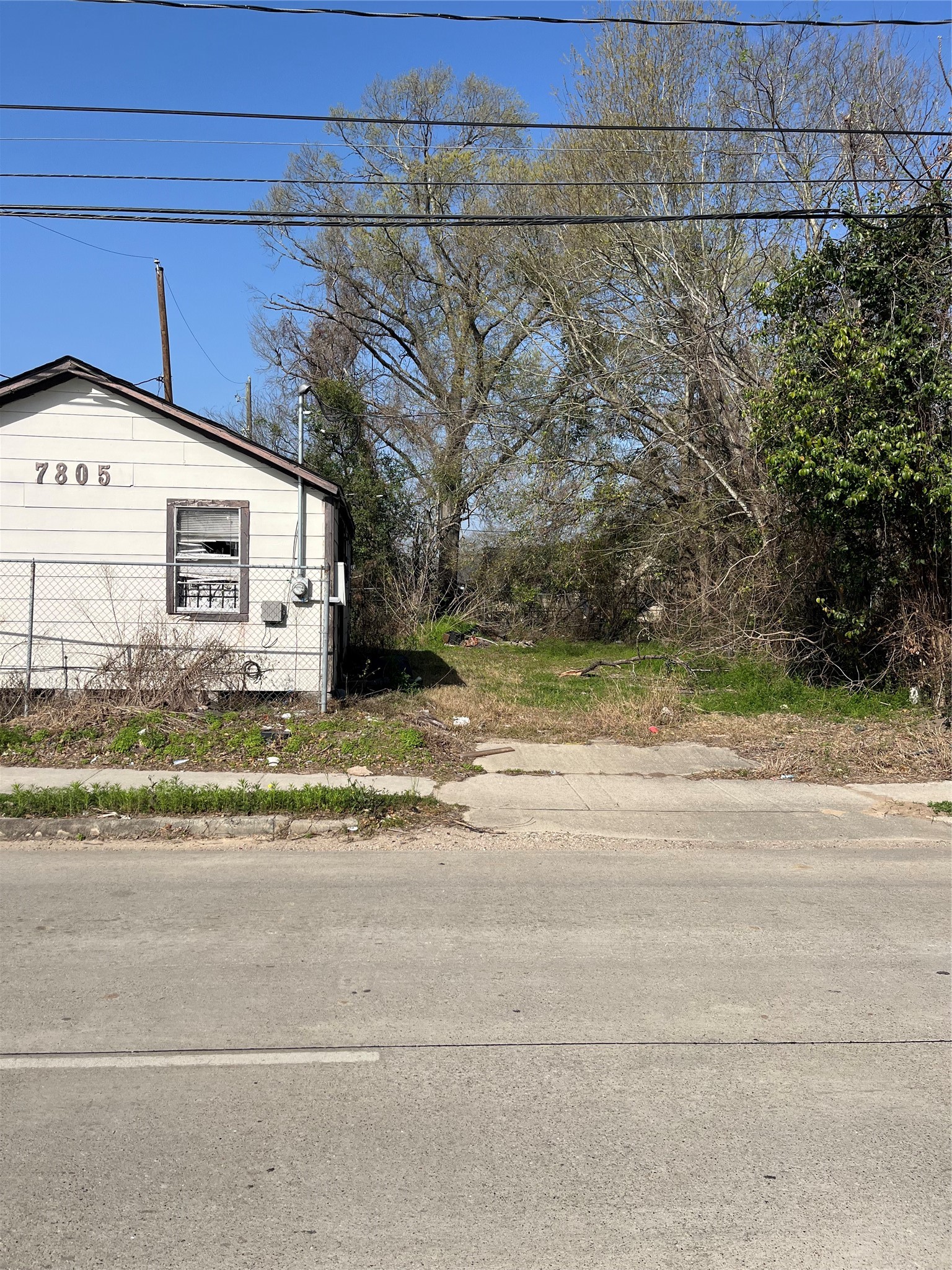 7805 Wheatley Street Houston, TX 77088 - Photo 4 of 8 a view of a house with a yard