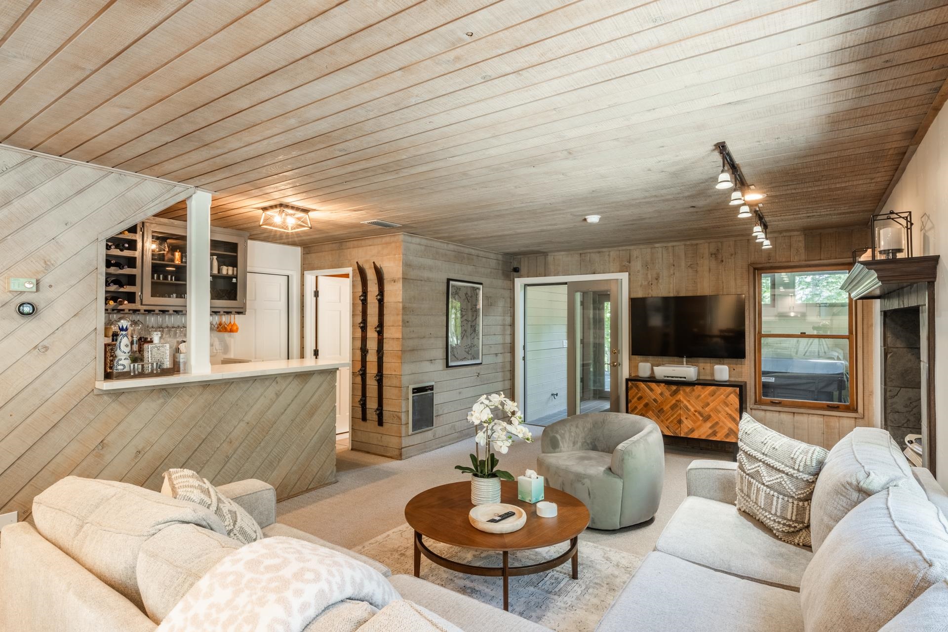 274 Silver Tip Lane Mammoth Lakes, CA 93546 - Photo 19 of 52 a living room with furniture and a flat screen tv