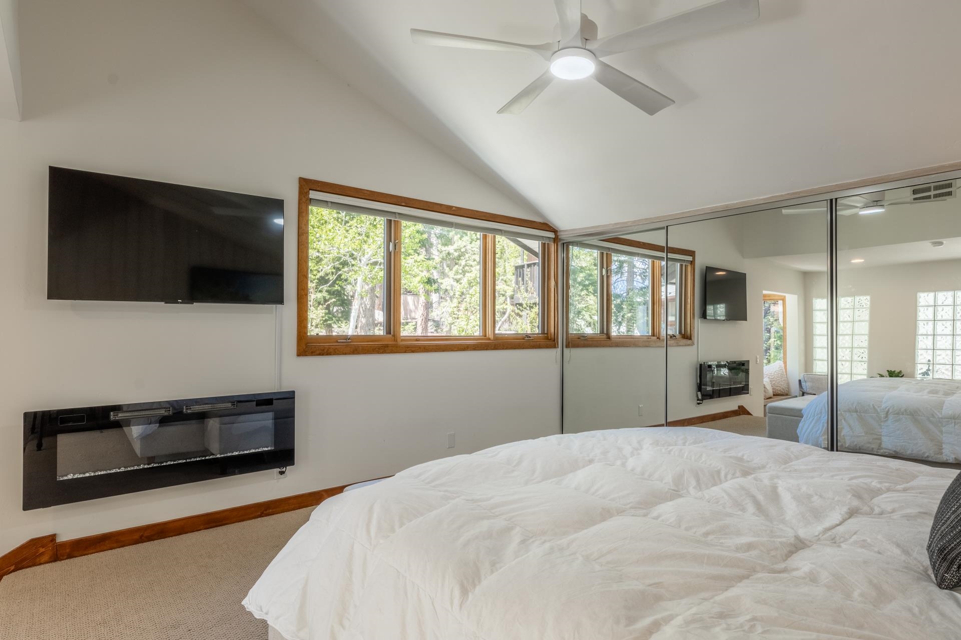 274 Silver Tip Lane Mammoth Lakes, CA 93546 - Photo 40 of 52 a bedroom with a bed and a flat screen tv