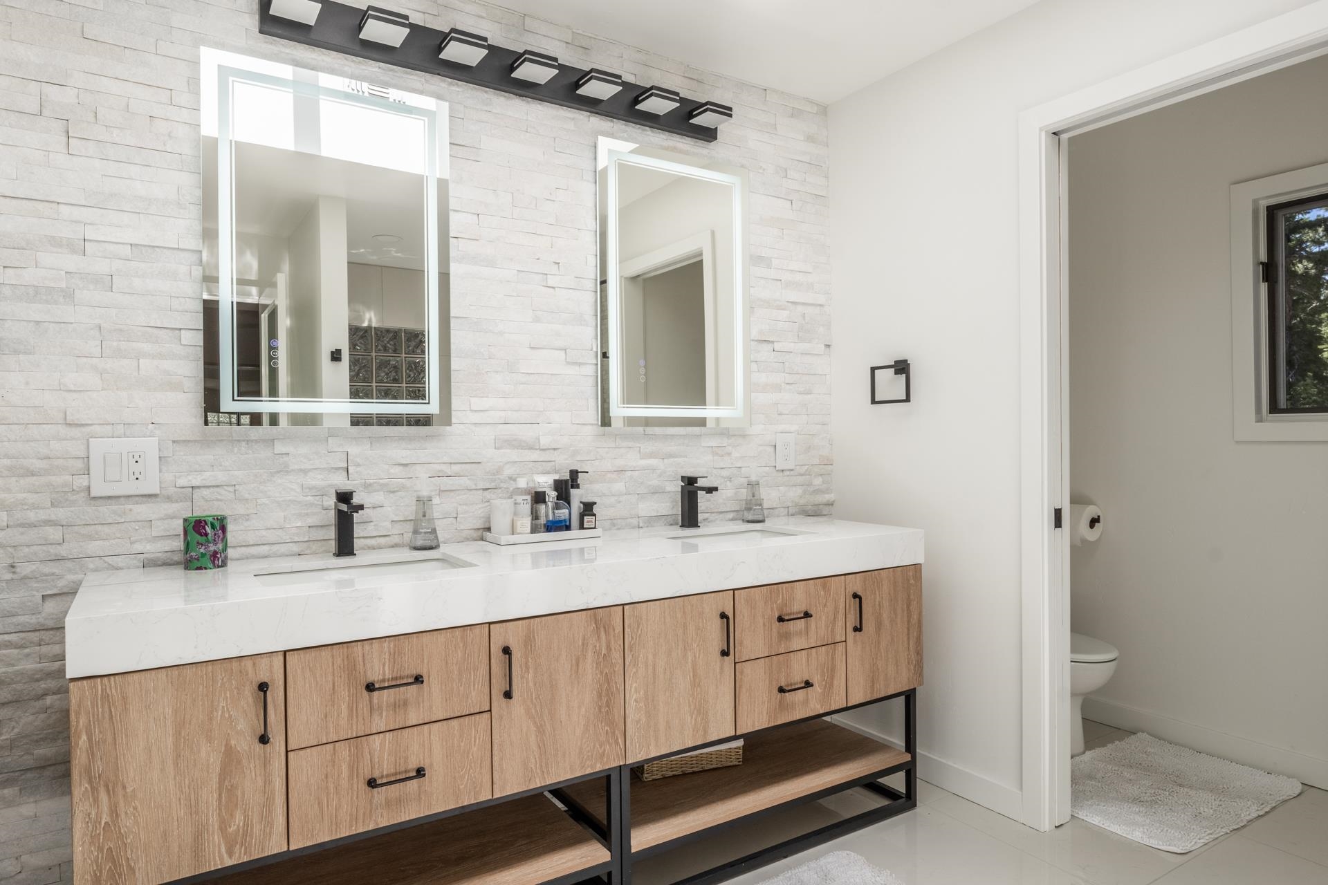274 Silver Tip Lane Mammoth Lakes, CA 93546 - Photo 41 of 52 a bathroom with a double vanity sink and mirror