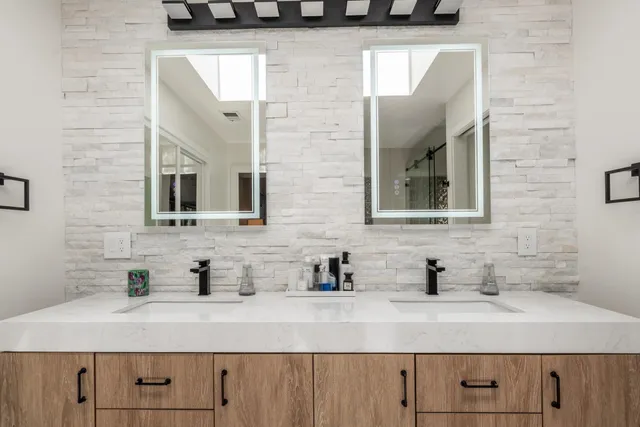 a bathroom with a shower and toilet