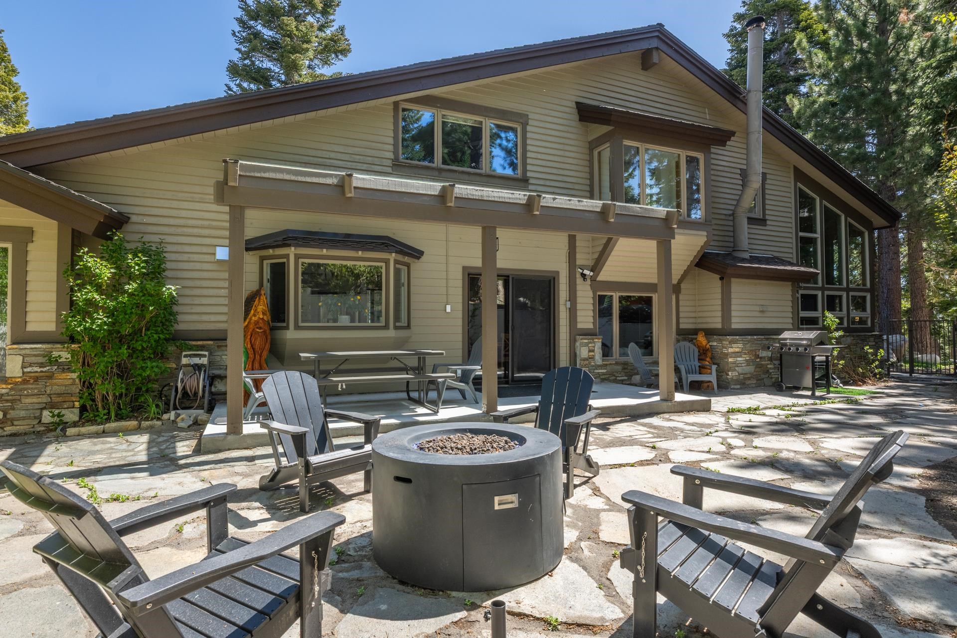274 Silver Tip Lane Mammoth Lakes, CA 93546 - Photo 48 of 52 a view of a dinning table and chairs in the patio