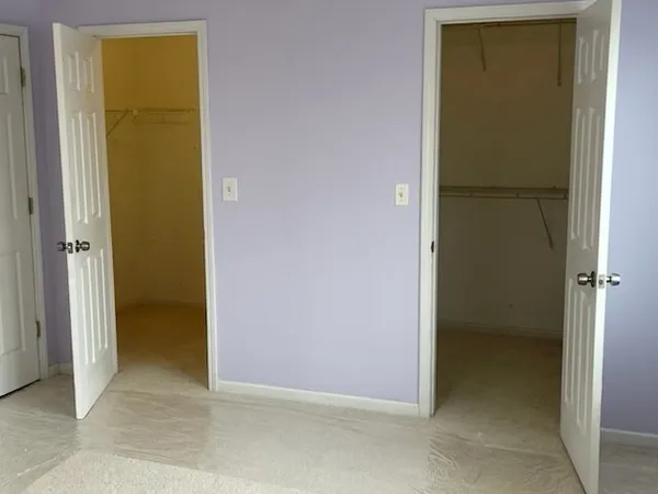 an empty room with closet