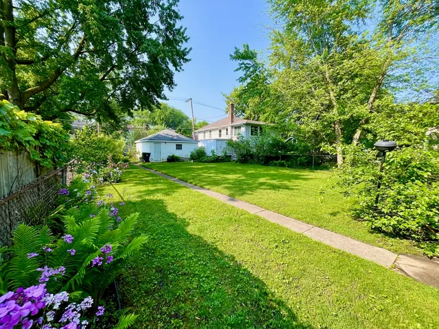 a view of street with parked cars