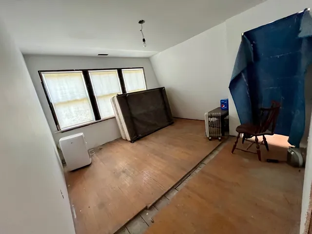 a view of a livingroom with furniture