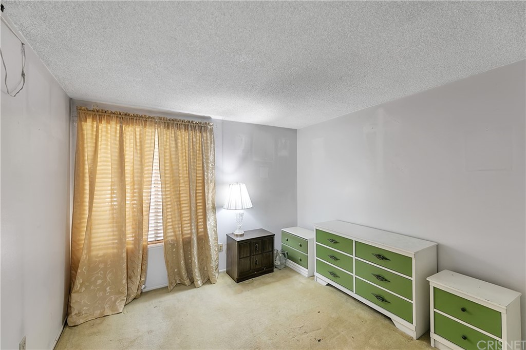 9689 Kewen Avenue Arleta, CA 91331 - Photo 20 of 28 a view of an empty room with a window