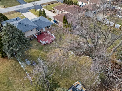 an aerial view of house with outdoor space