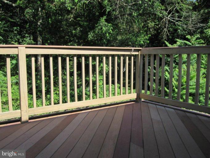10473 Tetotum Road King George, VA 22485 - Photo 12 of 23 a view of balcony with wooden floor