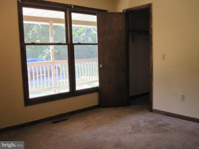 10473 Tetotum Road King George, VA 22485 - Photo 16 of 23 an empty room with windows