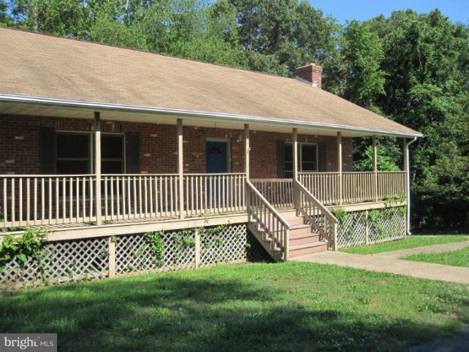 10473 Tetotum Road King George, VA 22485 - Photo 21 of 23 a view of a house with a garden