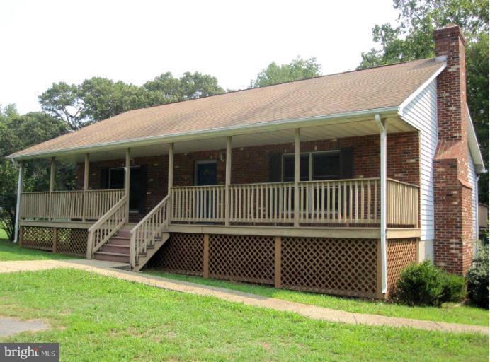 10473 Tetotum Road King George, VA 22485 - Photo 22 of 23 a view of a house with a backyard