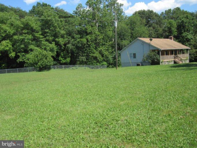 10473 Tetotum Road King George, VA 22485 - Photo 4 of 23 a aerial view of a house next to a big yard