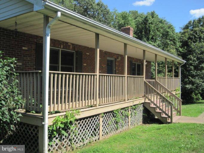 10473 Tetotum Road King George, VA 22485 - Photo 5 of 23 a view of a house with a deck