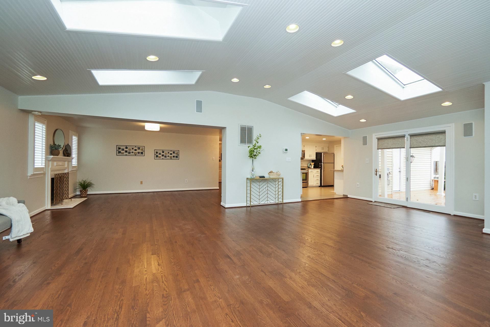 7605 Trail Run Road Falls Church, VA 22042 - Photo 9 of 44 Great Room Opens to Deck and Kitchen