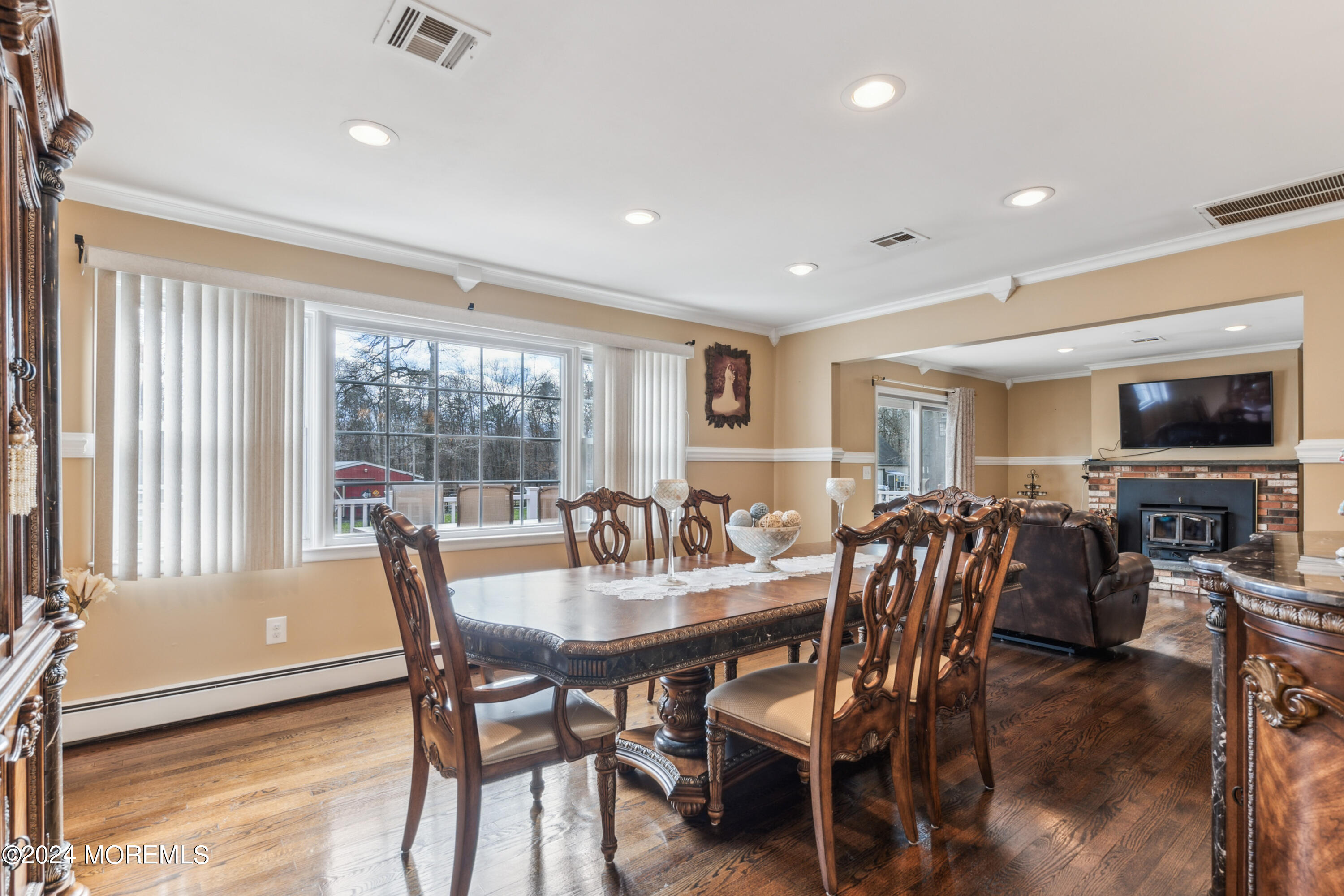 112 Porter Road Howell, NJ 07731 - Photo 13 of 39 a view of a dining room with furniture window and wooden floor