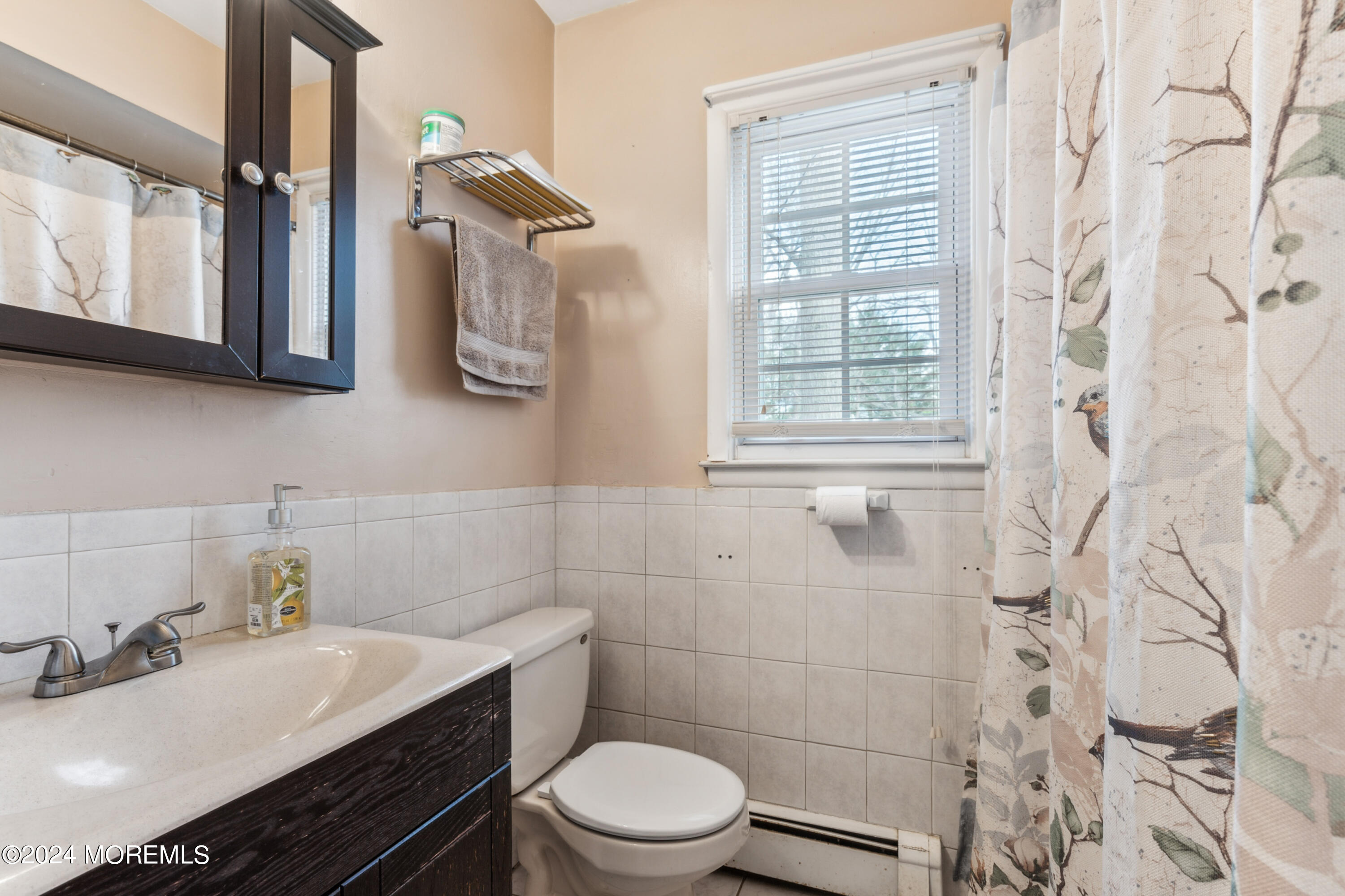 112 Porter Road Howell, NJ 07731 - Photo 19 of 39 a bathroom with a sink toilet and window