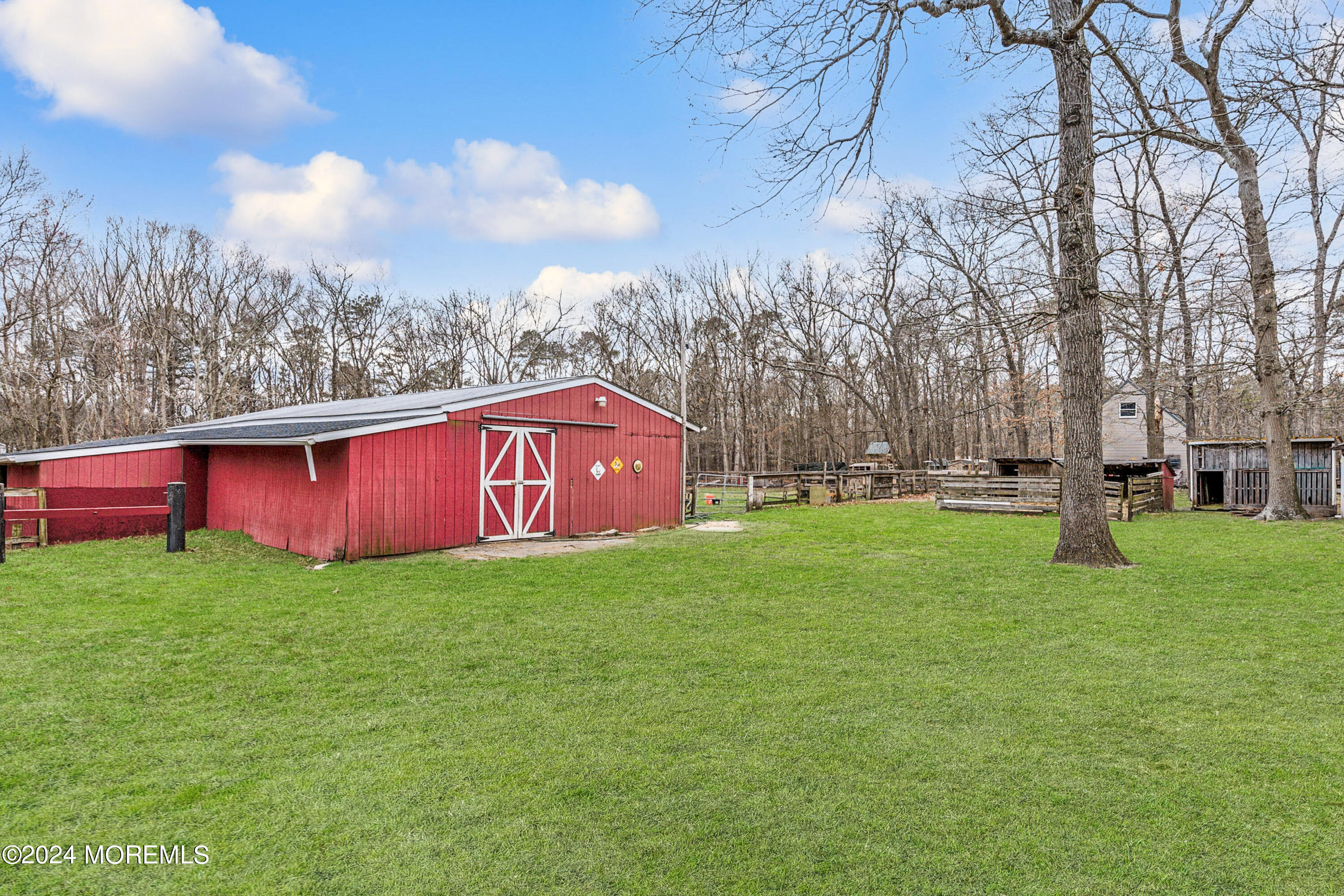 112 Porter Road Howell, NJ 07731 - Photo 27 of 39 a view of yard with swimming pool and trees in the background