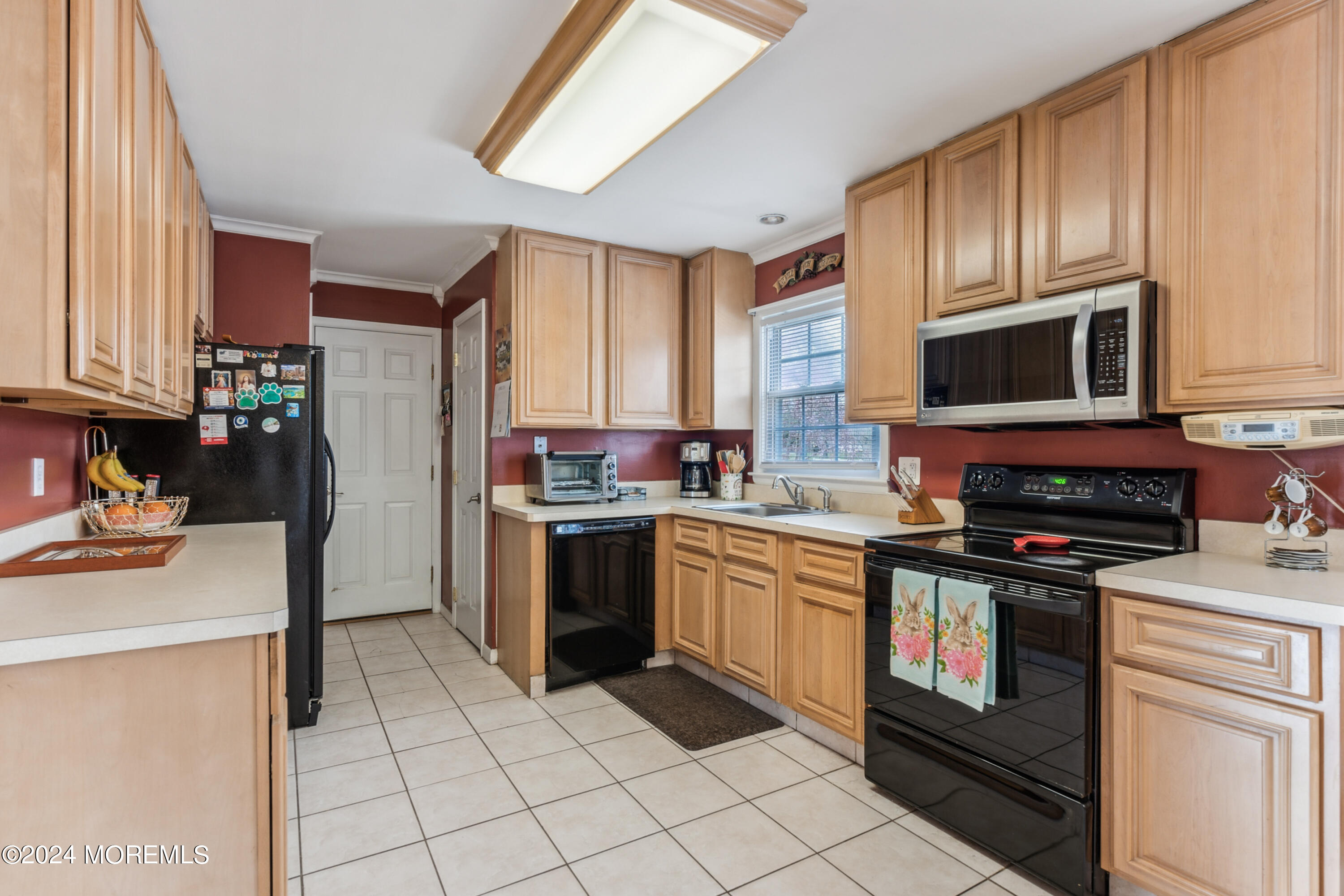 112 Porter Road Howell, NJ 07731 - Photo 7 of 39 a kitchen with stainless steel appliances granite countertop a stove a sink dishwasher and a refrigerator