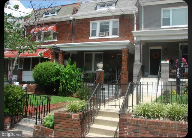 a front view of a house with a porch