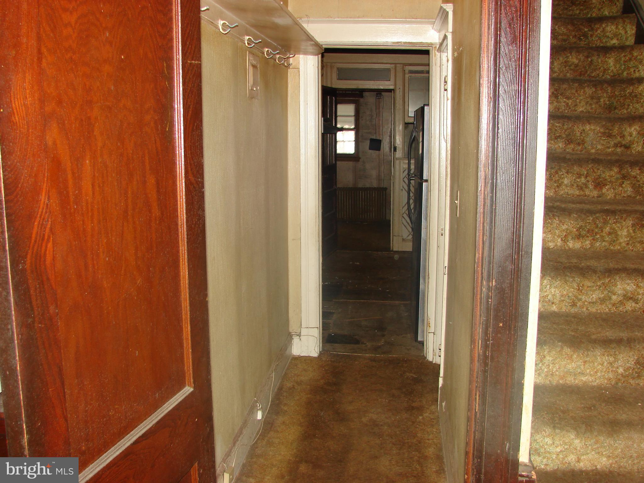 415 Farragut Street Northwest Washington, DC 20011 - Photo 11 of 27 a view of a bathroom from a hallway