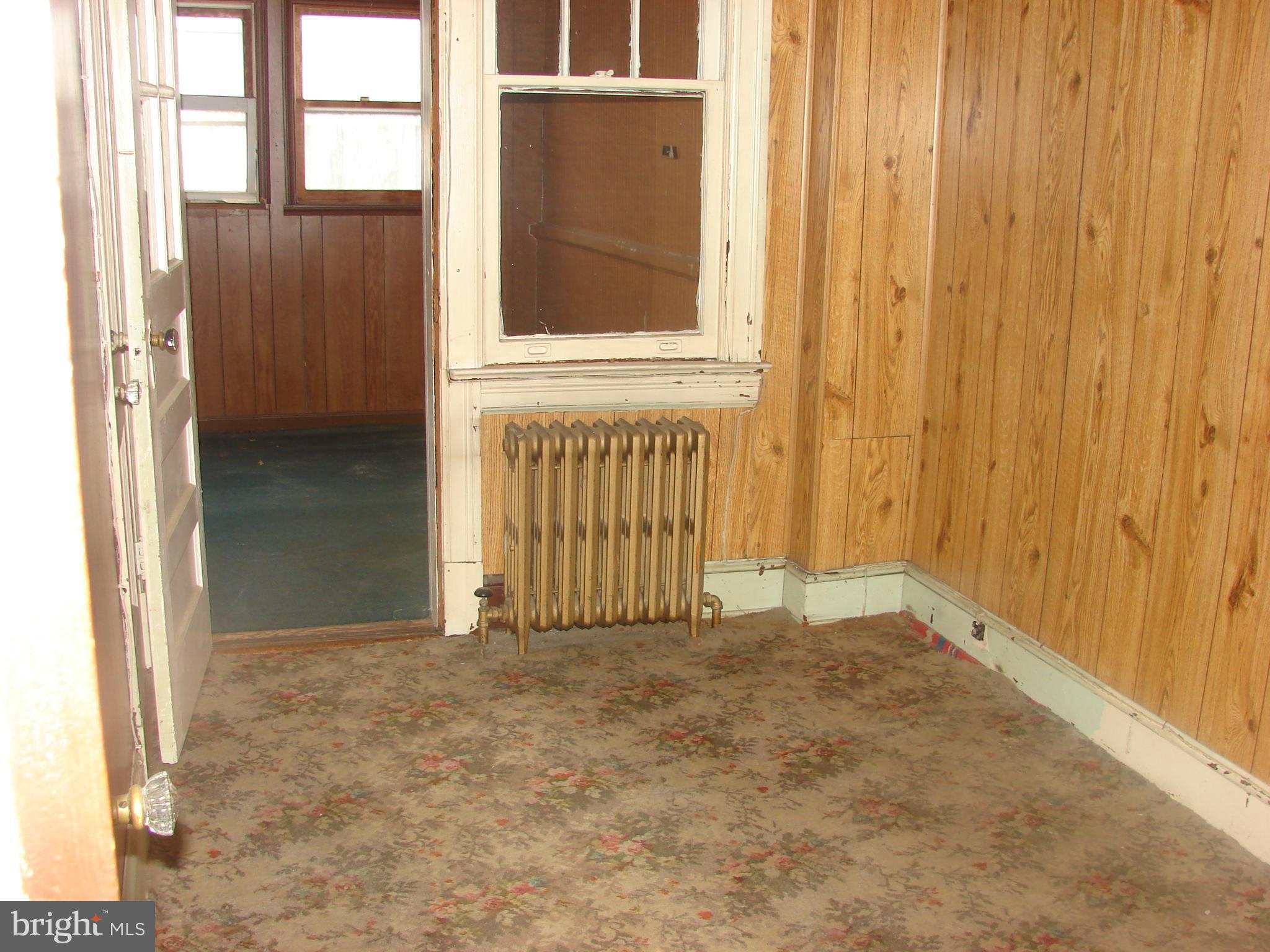 415 Farragut Street Northwest Washington, DC 20011 - Photo 12 of 27 an empty room with windows