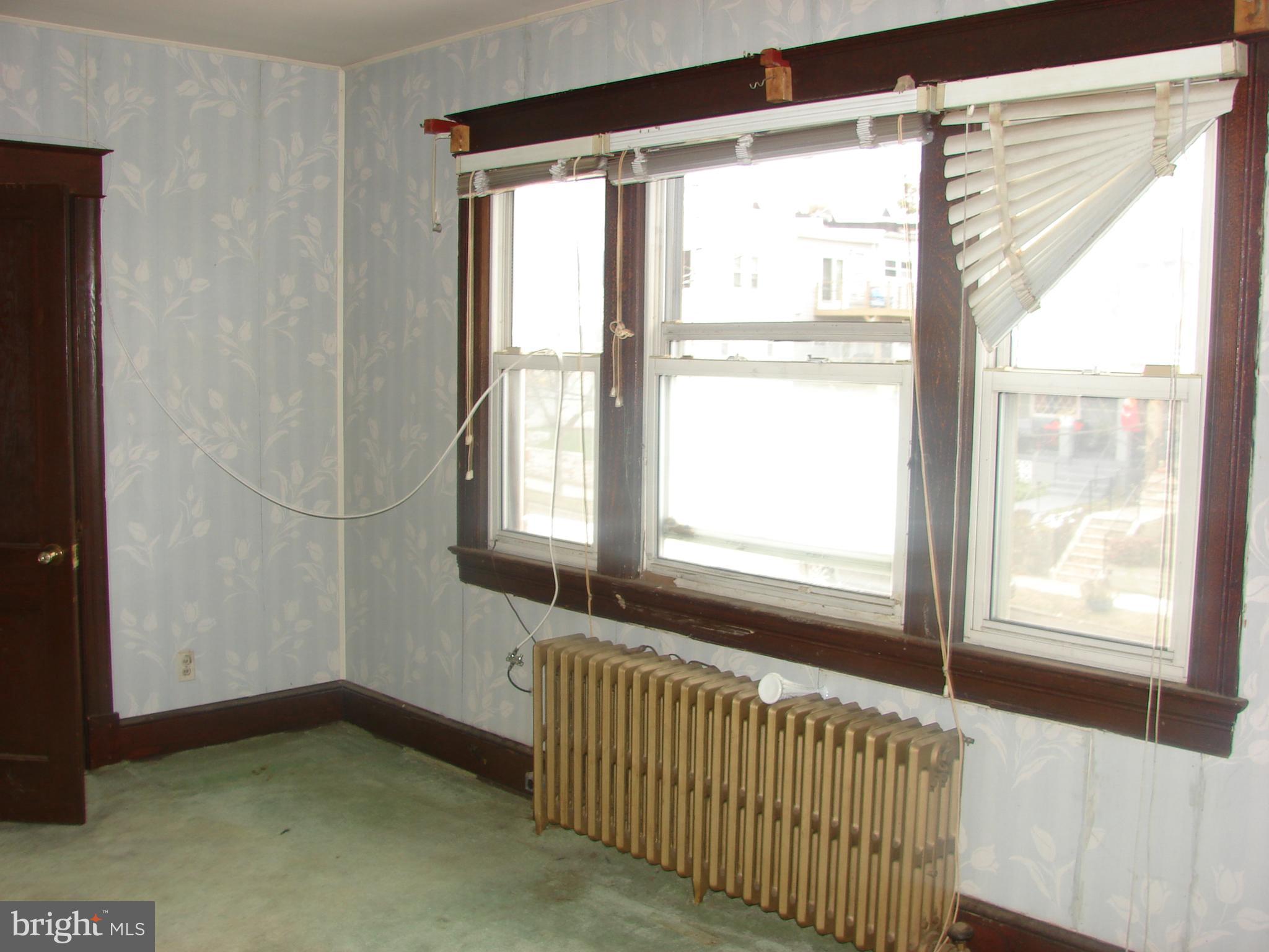 415 Farragut Street Northwest Washington, DC 20011 - Photo 19 of 27 a view of an empty room with a window