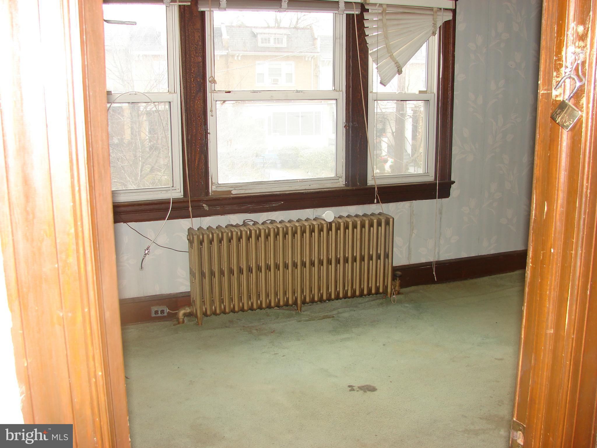 415 Farragut Street Northwest Washington, DC 20011 - Photo 20 of 27 a view of an empty room with a window