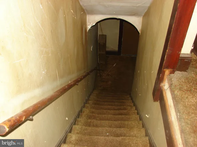 a view of buildings with yard