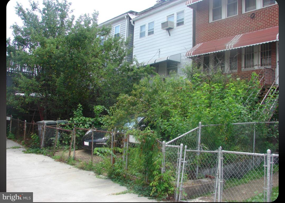 415 Farragut Street Northwest Washington, DC 20011 - Photo 5 of 27 a view of a house with a yard