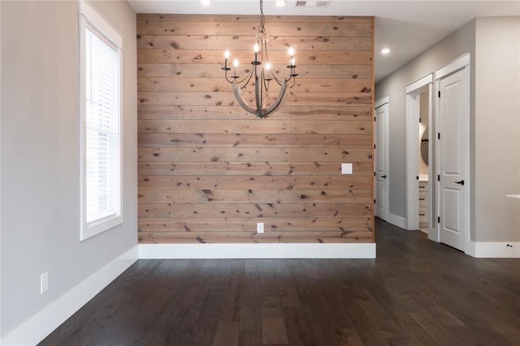 116 West Main Street, Unit 2A Blue Ridge, GA 30513 - Photo 12 of 14 a view of empty room with wooden floor and window