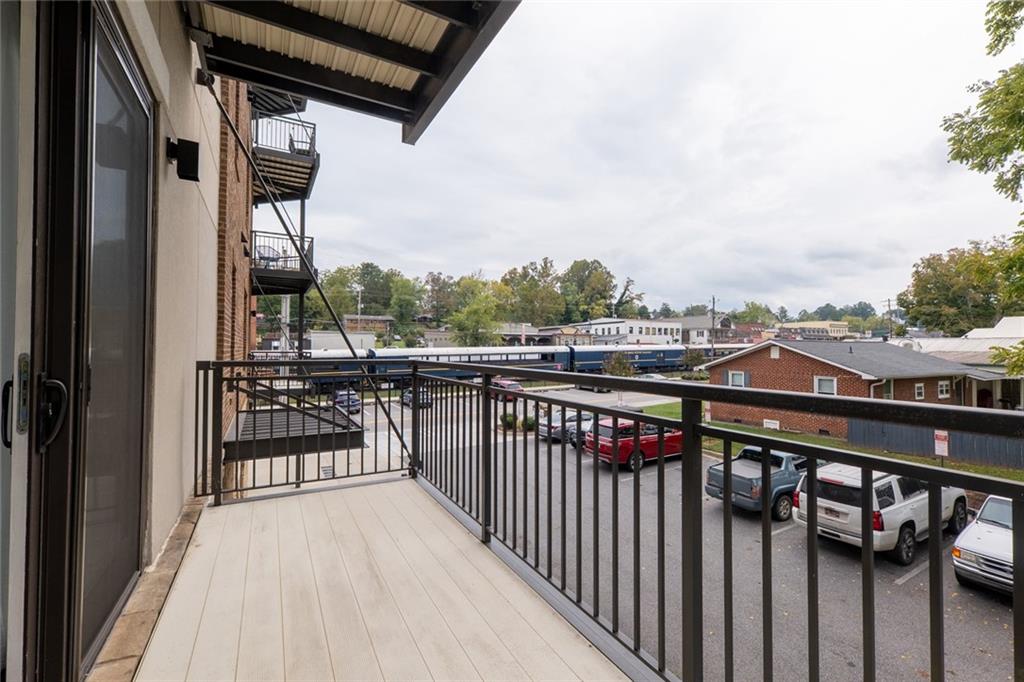 116 West Main Street, Unit 2A Blue Ridge, GA 30513 - Photo 14 of 14 a view of city from a balcony