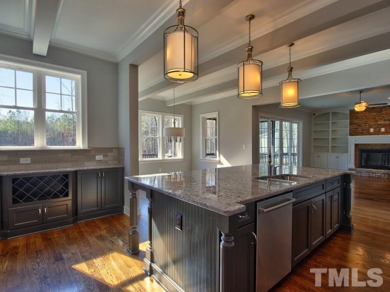 2117 Old Sorrell Road Apex, NC 27539 - Photo 4 of 25 Kitchen features tons of great counter space and bright, open layout!