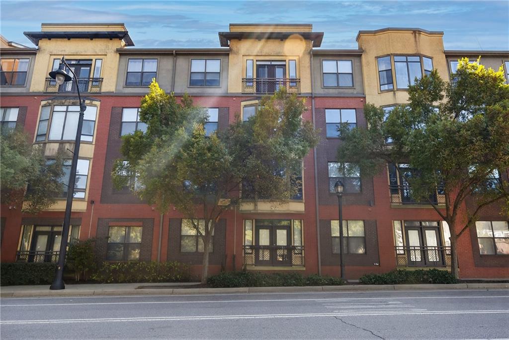 400 17th Street Northwest, Unit 2406 Atlanta, GA 30363 - Photo 11 of 16 a front view of a multi story building
