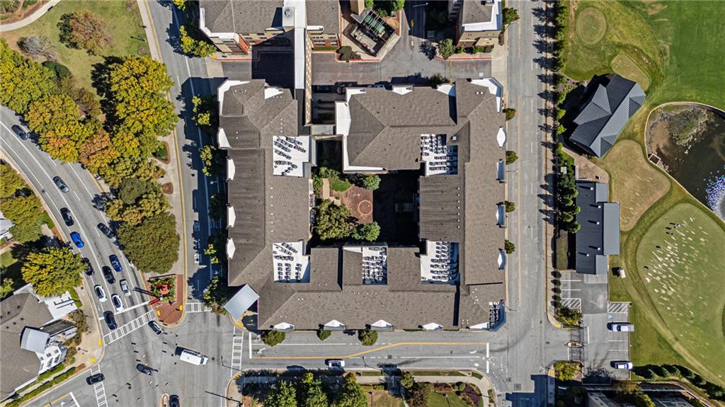 400 17th Street Northwest, Unit 2406 Atlanta, GA 30363 - Photo 16 of 16 an aerial view of residential houses with outdoor space