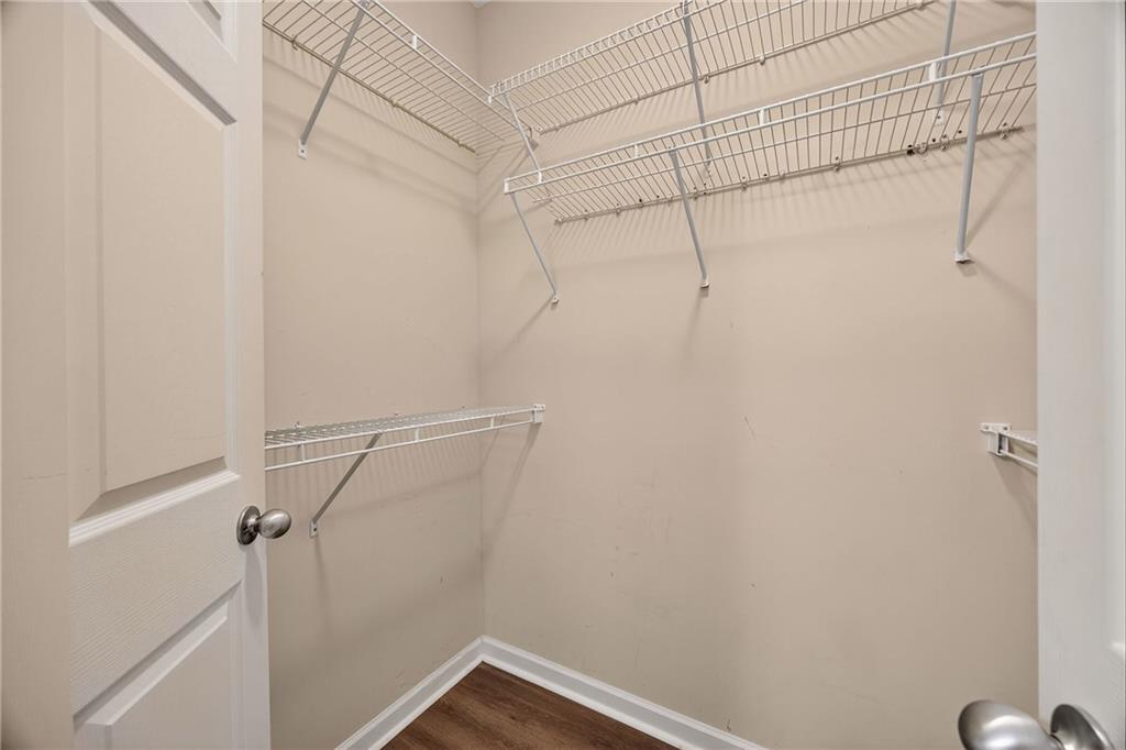 400 17th Street Northwest, Unit 2406 Atlanta, GA 30363 - Photo 9 of 16 a view of a room with racks on the wall