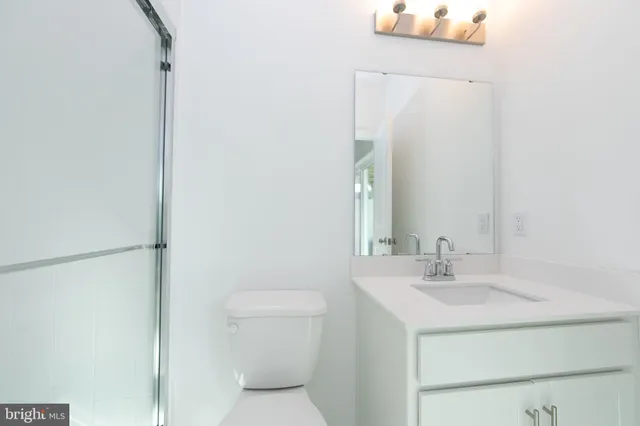 a bathroom with a sink and a toilet