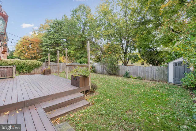 a view of a backyard with wooden floor