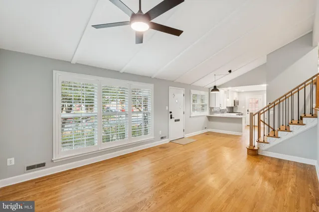 a view of an empty room with a window