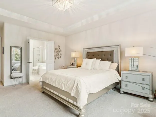 a bed room with a bed and a night stand