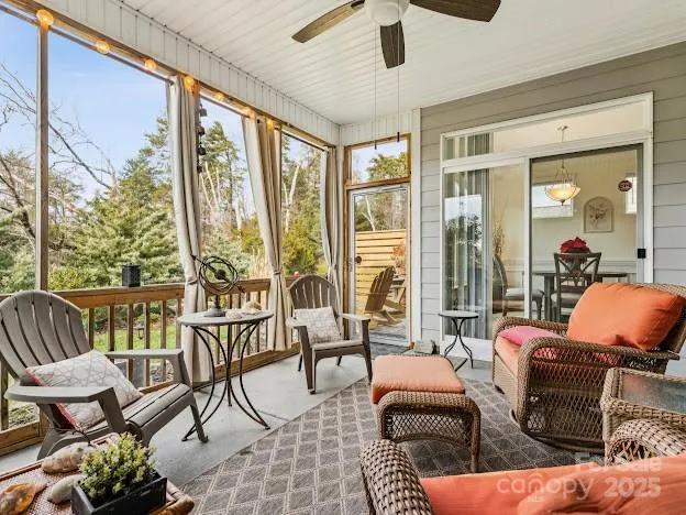 a outdoor living space with furniture and a large window
