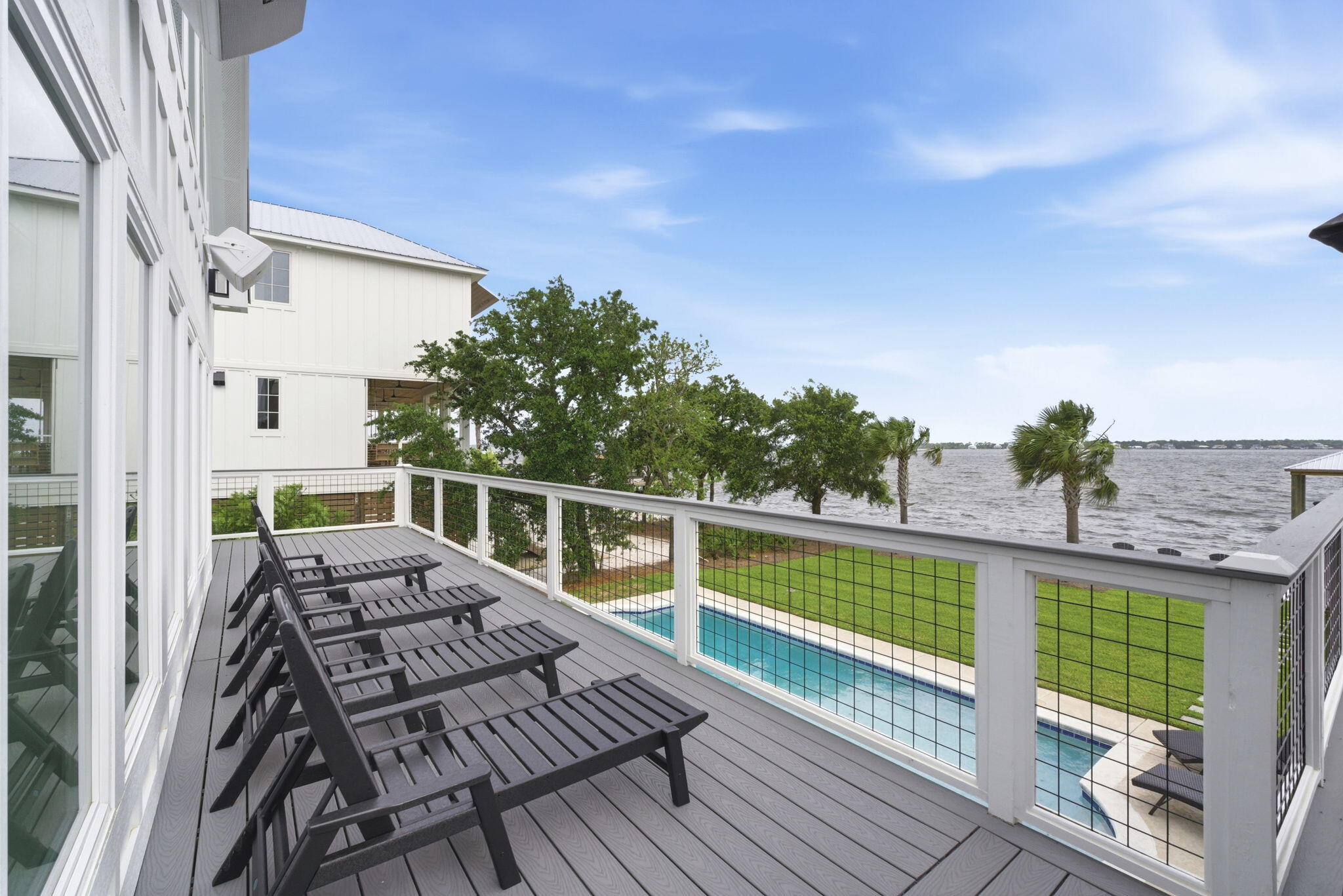 31061 Peninsula Drive Orange Beach, AL 36561 - Photo 64 of 93 a view of balcony with wooden floor and seating space