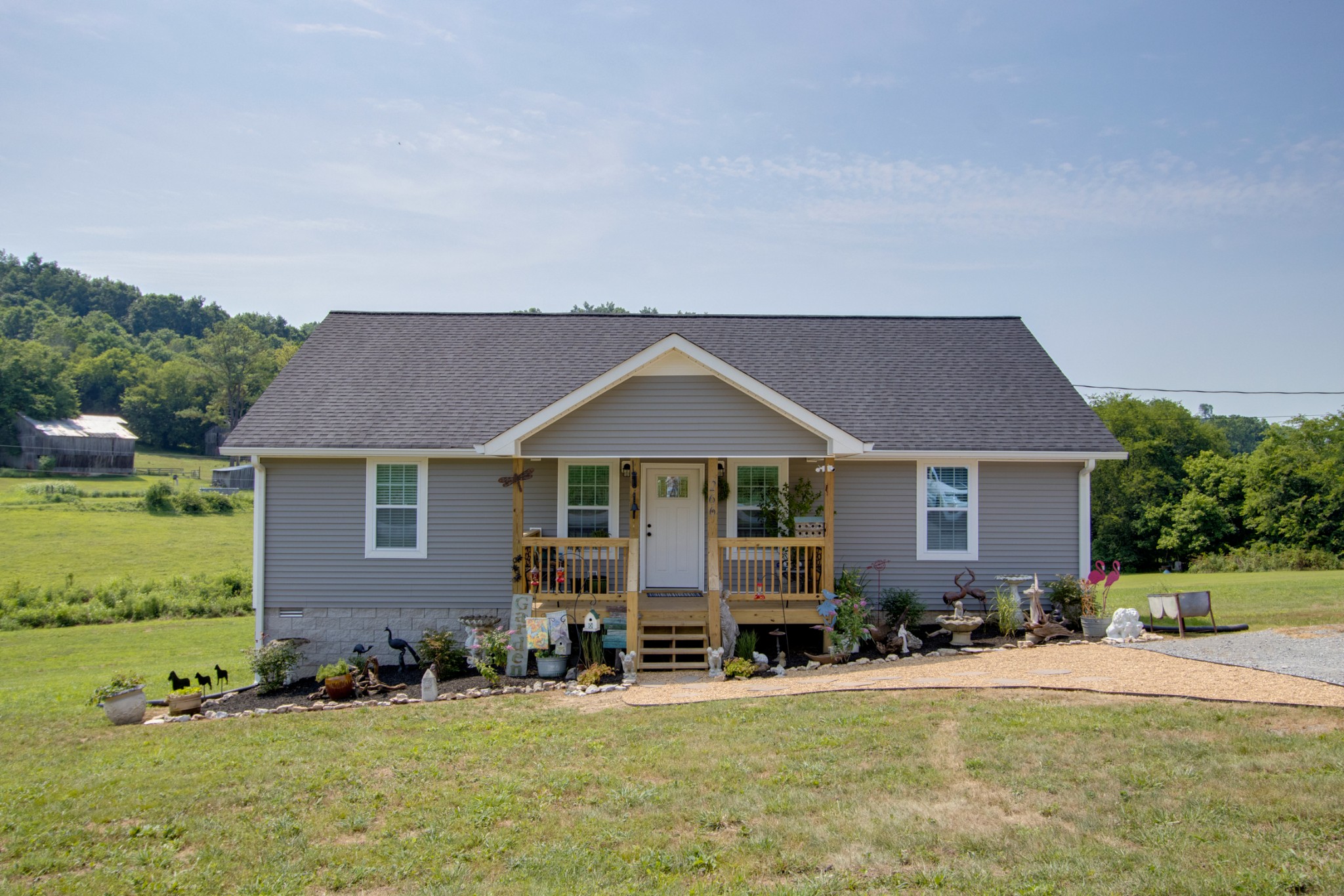 front view of a house with a yard