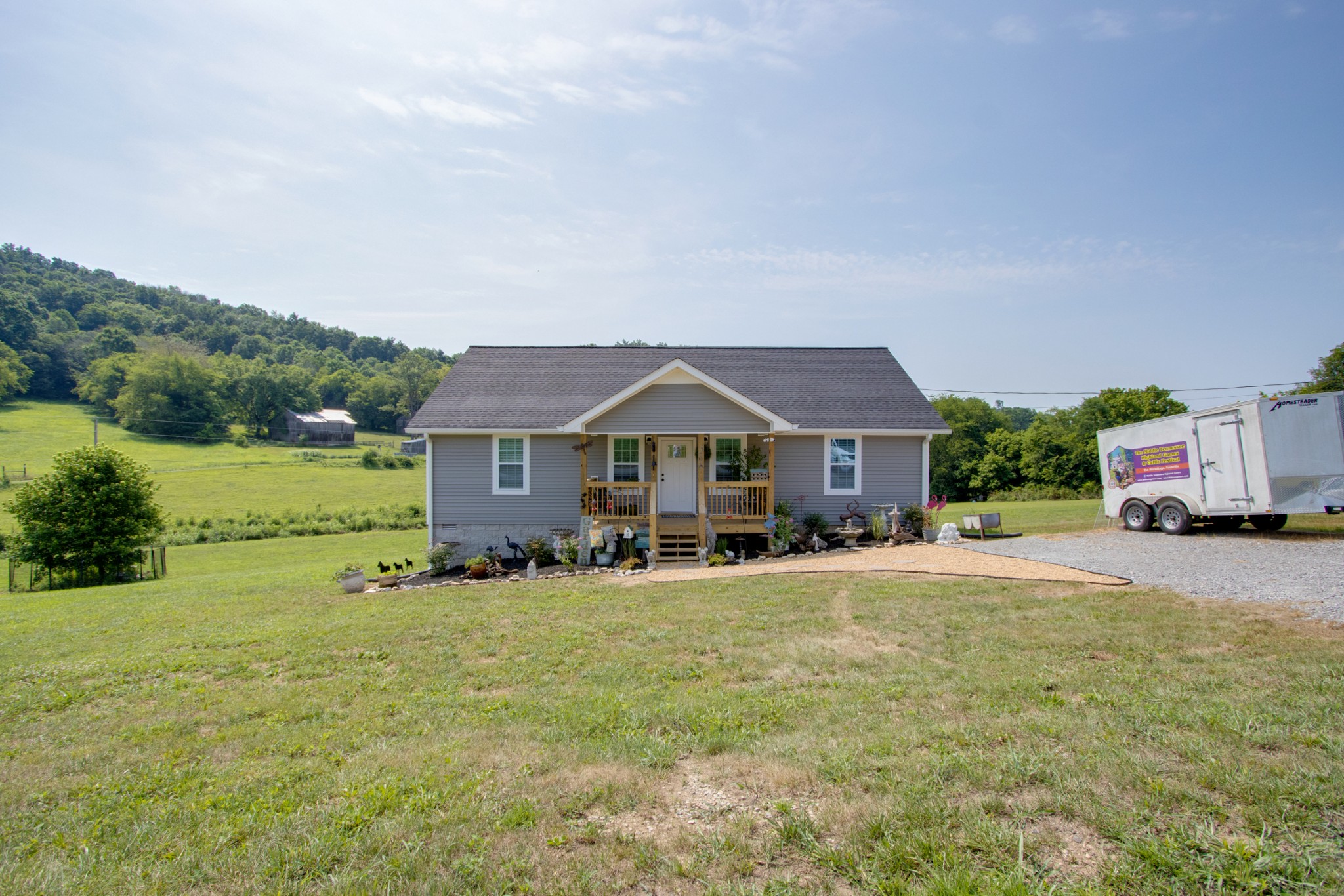 266 Buffalo Road Carthage, TN 37030 - Photo 3 of 35 a front view of a house with garden