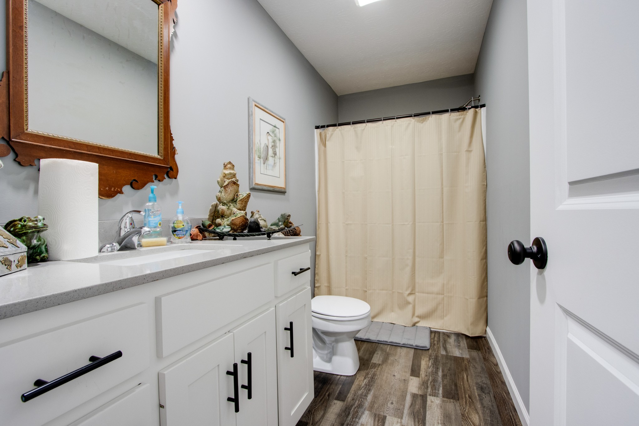 266 Buffalo Road Carthage, TN 37030 - Photo 28 of 35 a bathroom with a sink a toilet a window and shower