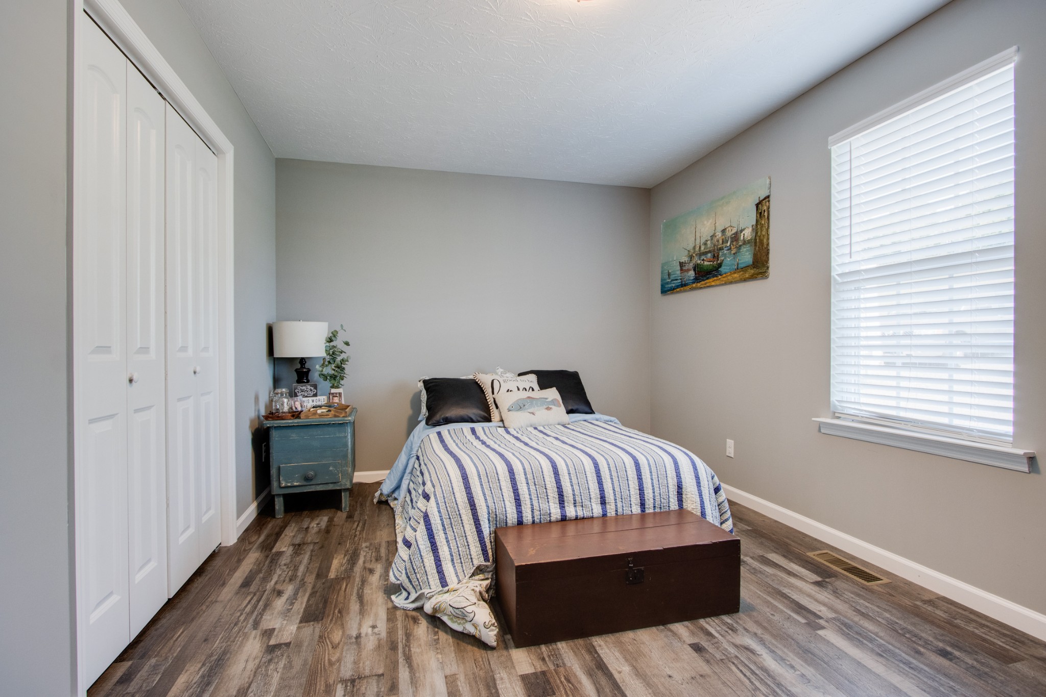 266 Buffalo Road Carthage, TN 37030 - Photo 30 of 35 a bedroom with a bed and wooden floor