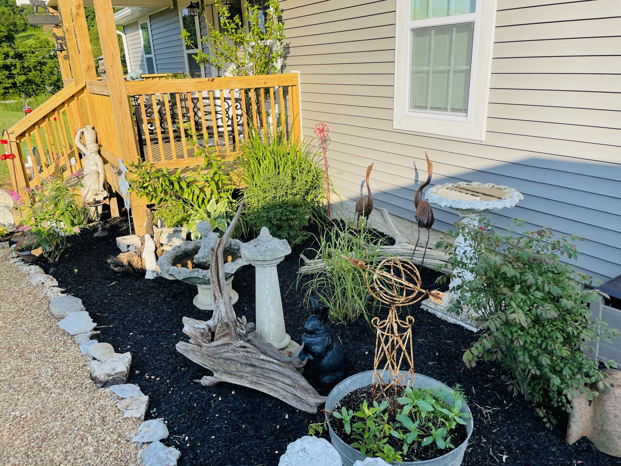 266 Buffalo Road Carthage, TN 37030 - Photo 5 of 35 a potted plant sitting in front of a house