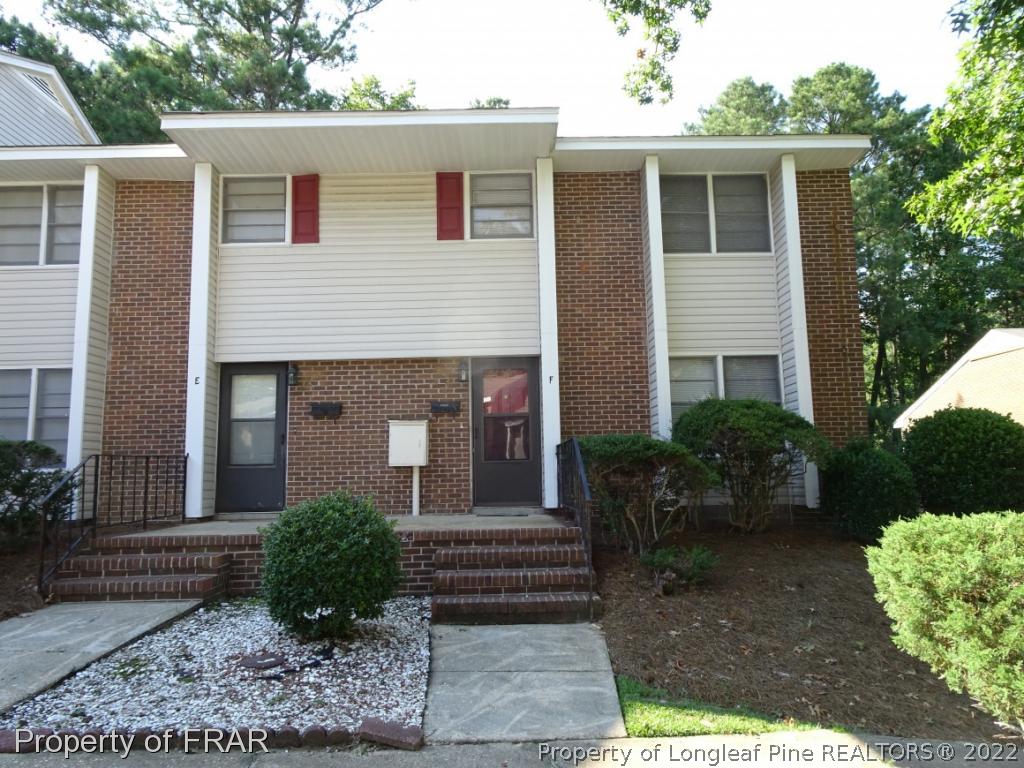 571 F Winding Creek Road Fayetteville, NC 28305 - Photo 1 of 15 a front view of a house with garden