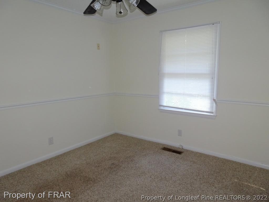 571 F Winding Creek Road Fayetteville, NC 28305 - Photo 10 of 15 an empty room with a window